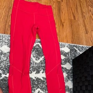 red lululemon cropped leggings with pockets